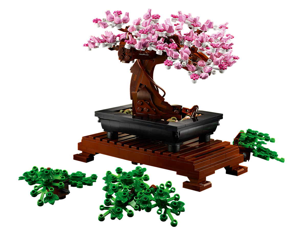 Customized LEGO bonsai tree with tiny frogs and blossoms